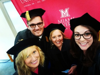 Jose, Greta, Alyssa, and me at our hooding ceremony.